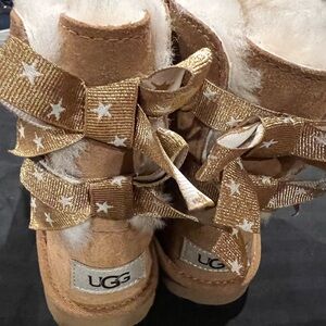 Girls Size 11 Uggs with gold ribbon